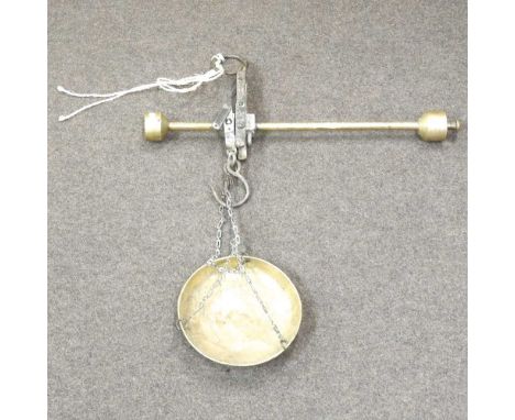 A brass game scale