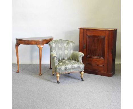 A Victorian mahogany cabinet, together with a Victorian nursing chair and a walnut console table (3)Cabinet 73w x 27d x 92h c