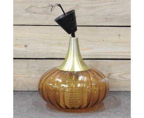 A 1960's ceiling light, with an amber glass shade, 40cm high