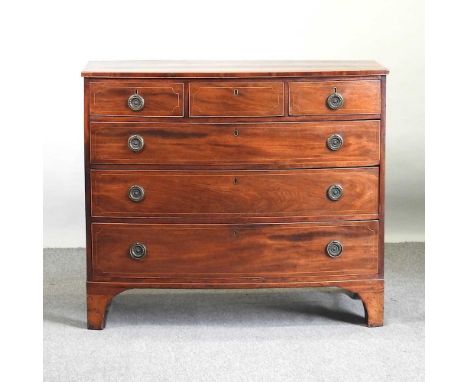 A George III mahogany bow front chest of drawers, containing six drawers, on swept bracket feet112w x 54d x 97h cm