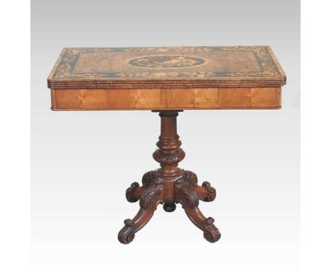 A 19th century walnut and floral marquetry folding card table, with a hinged rectangular top, on a carved quadruped base96w x