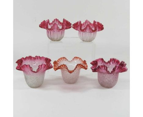 A collection of five cranberry glass light shades, each with a 3cm aperture (5)