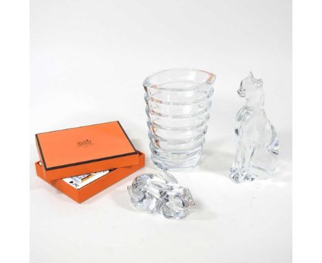 A Baccarat crystal model of a seated cat, 16cm high, together with a rabbit and a ribbed vase, all stamped, together with a p