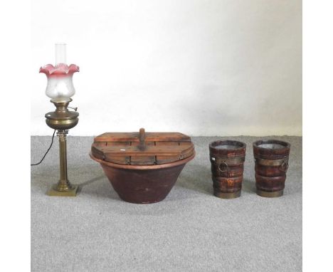 A large 19th century slipware dairy bowl, with a wooden lid, 54cm diameter, together with a pair of brass mounted coopered wo