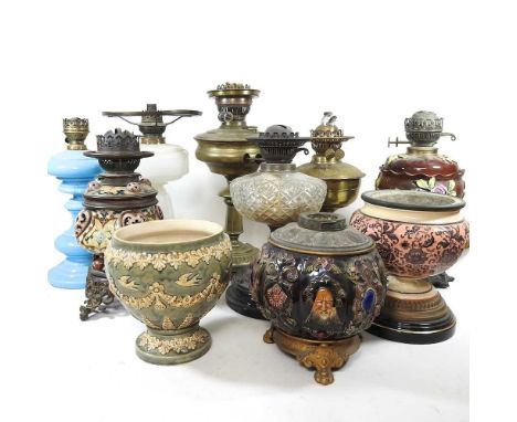 A collection of ten various oil lamps bases, to include Doulton, tallest 38cm (10)The lamp with the raised hearts is Zsolnay 