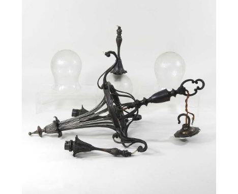 An ornate 19th century silver plated three branch ceiling light, with glass shades, 54cm highOne shade is chipped, so missing