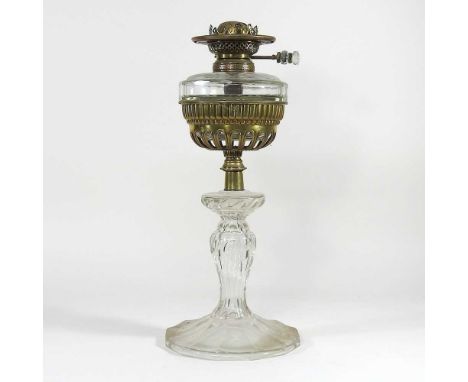 A brass and cut glass oil lamp base, with a glass reservoir and facet cut glass stem, 46cm highOverall very dirty. The inside