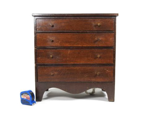 An early 20th century mahogany apprentice chest, containing four long graduated drawers, on swept bracket feet36w x 21d x 38h