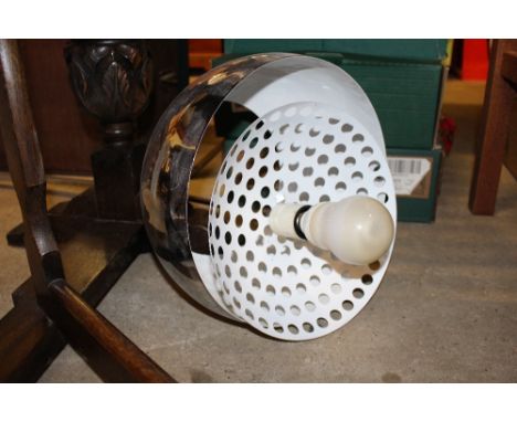 A large chrome and marble based standard lamp