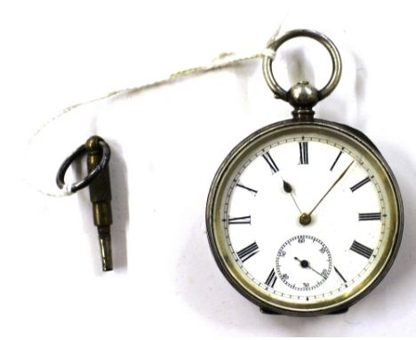 A Dent and Sons of London silver cased pocket watch with key