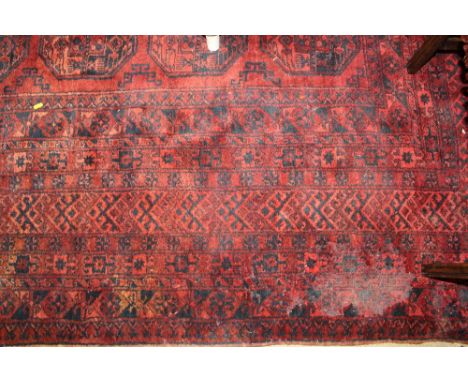 An approximate 13' x 10' 6" Persian style carpet (worn)