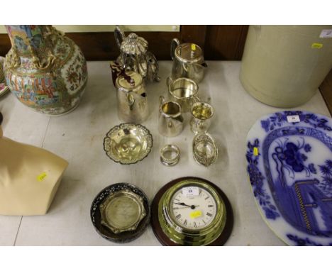 A quantity of various silver and stainless steel items to include teapots; cream jugs etc. together with a brass ship's style