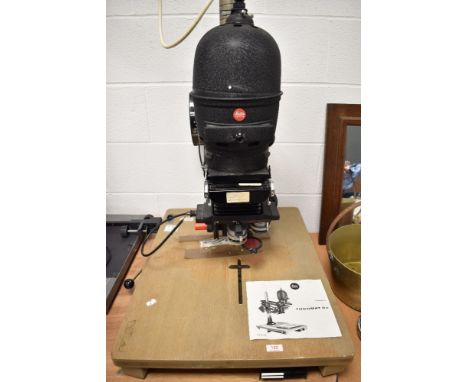 A Leitz Wetzlar Focomat IIC enlarger
untested, appears complete however, no further info on history of item.
