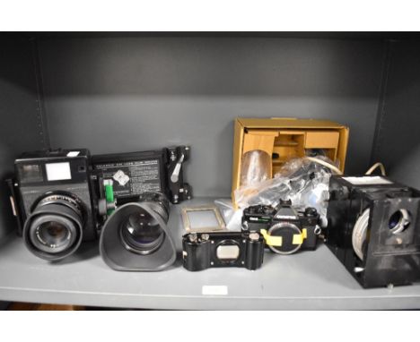 A Mamiya Universal Polaroid camera with Mamiya Sekor 100mm lens No12657, an Olympus OM-2 camera body, A JVC TV lens etc