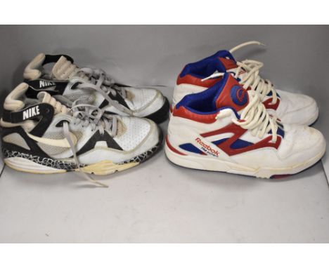 A pair of Reebok The Pump Limited Edition trainers size UK7, and a similar pair of vintage Nike 34