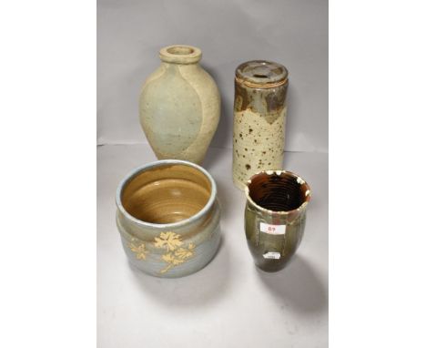 A selection of 20th century studio pottery including hand thrown vase, storage container, planter and vase.