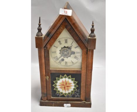 A late Victorian American gothic style mantle clock having thirty hour time piece by Welch Forestville