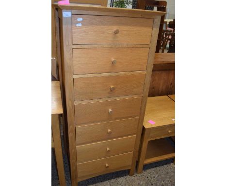 Modern light oak seven drawer chest, 60cm wide