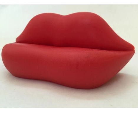 The "Lips Sofa" is a distinctive and iconic piece of furniture designed by Italian artist and designer Salvador DalÃ in 1936.