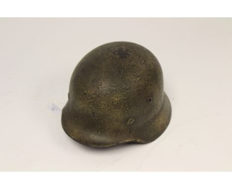 Third Reich M40 Stalhelm steel helmet. Shell stamped "Q64". Traces of original feld grau paint to the interior. Liner present