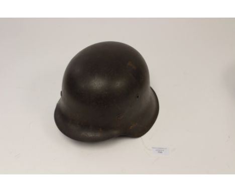 Third Reich M42 Stalhelm steel helmet. Shell stamped "ET 64". No decals. Liner present but a/f. No chinstrap. 