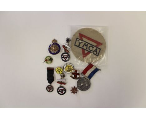 A Collection of WW1 and WW2 Enamel badges to include a Derby Special Constable's cap badge, YMCA War Service Munition Canteen