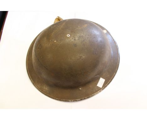 World War 2 British steel helmet with liner and chinstrap, liner marked size 7 BMB 1939 