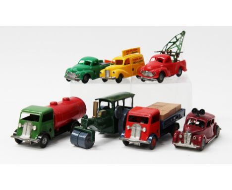 Tri-ang: A collection of seven unboxed 'Minic' Tri-ang Toy vehicles to include a Steam Roller, Pick-up truck, Tanker, Flat-be