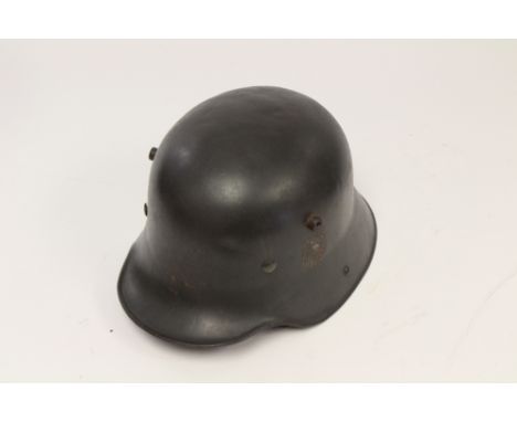 Third Reich Transitional Heer M16 Stalhelm steel helmet. Shell stamped "ET66". National colours decal present, Heer eagle has