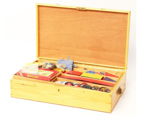 Meccano: A Large collection of Meccano housed in a stained wooden box with hinged lid, lift-out tray to include brackets, boi