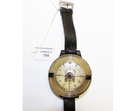 WW2 Third Reich Luftwaffe Wrist Compass with original leather strap. Marked AK 39 and FL 23235-1.