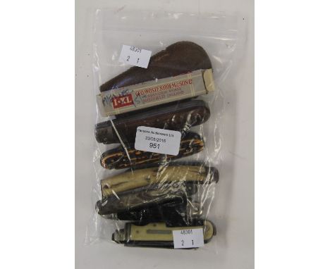 A good collection of seven vintage penknives and one sharpening stone. Including one boxed knife by George Wostenhold, Sheffi