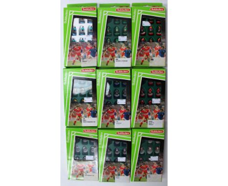 Subbuteo: A collection of nine boxed complete International teams to include: Peru "no. 455", Brazil World Champions 1994 "no