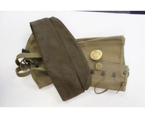 WW2 US Army Enlisted mans Overseas cap, size 7. US Army enlisted mans cap badge and an enlisted mans US collar dog; US Army I