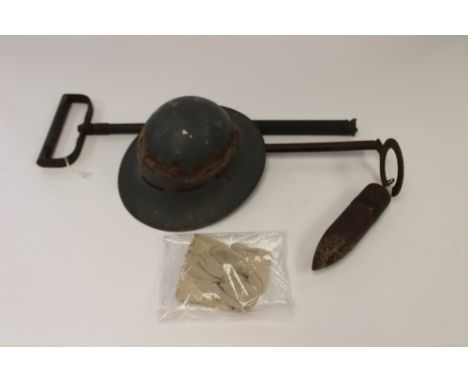 WW2 British Firewatchers Steel helmet and a WW1 empty solid shell, also a World War II Stirrup Pump and a pair of white airma