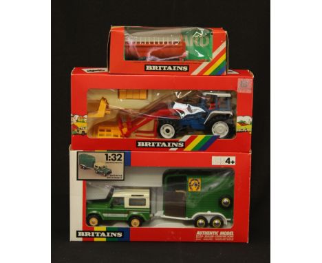 Britains: A Britains No.9617 Ford 5610 Tractor and Front Loader System, a Britains No.9612 Landrover and Horsebox and a Brita