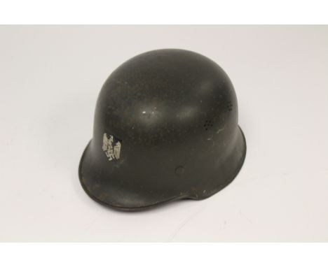 Third Reich M34 Civic Stalhelm steel helmet. Feld grau paint. Liner and chinstrap present. Liner ink stamped "Offizierschule 