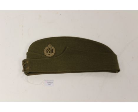 WW2 British Army Officers private purchase field service cap. Maker marked with label under celluloid "Simpson of Piccadily".