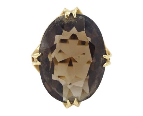 9ct gold single stone oval cut large smokey quartz ring, hallmarkedCondition Report:Approx 9.8gm, size R-S, max depth = 27mm
