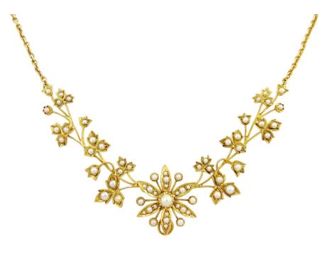 Edwardian 15ct gold split pearl flower head and foliate necklaceCondition Report:Approx 16.3gm, length = 39cm, max flower hea