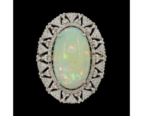 Silver opal and diamond ring, the cabochon opal of approx 9.65 carat, with round brilliant cut diamond surround, in a pierced