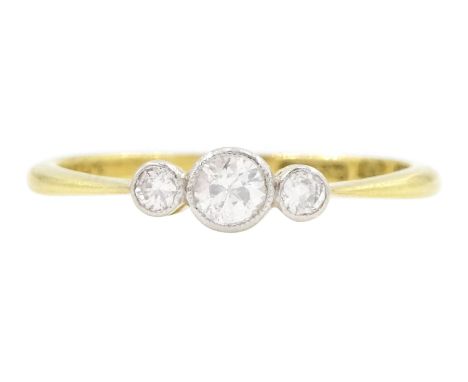 Early 20th century gold milgrain set, three stone old cut diamond ring, stamped 18ct PT, total diamond weight approx 0.25 car