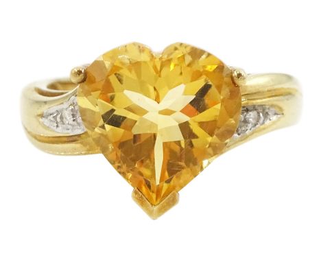 9ct gold three stone heart cut citrine and diamond chip ring, hallmarkedCondition Report:Approx 4.3gm, size N, good condition