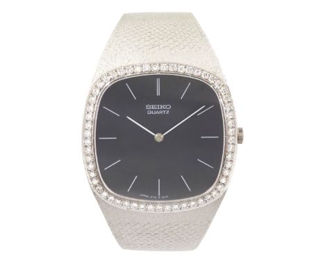Seiko gentleman's 18ct white gold quartz wristwatch, black dial with baton hour markers and round brilliant cut diamond bezel