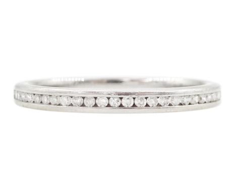 Platinum channel set round brilliant cut diamond three quarter eternity ring, hallmarked, total diamond weight 0.10 caratCond