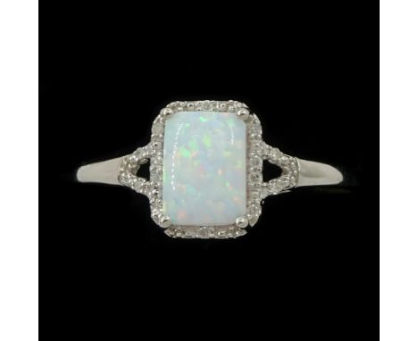 9ct white gold opal and diamond cluster ring, with diamond set shoulders, hallmarkedCondition Report:Approx 1.85gm, size R, g