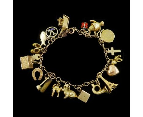 Gold fancy link bracelet, with twenty 9ct gold charms including enamel ladybird, teddy bear, Noah's Ark, axe, cat, dice and '