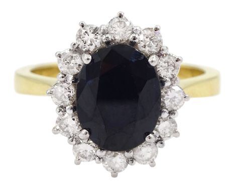 18ct gold oval sapphire and round brilliant cut diamond cluster ring, hallmarked, total diamond weight approx 0.55 carat, sap
