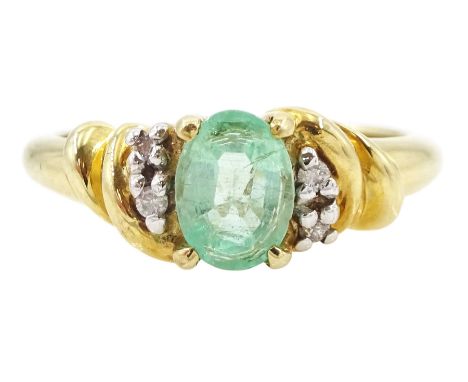 9ct gold five stone oval cut emerald and diamond ring, hallmarked, emerald approx 0.60 caratCondition Report:Approx 2.9gm, si