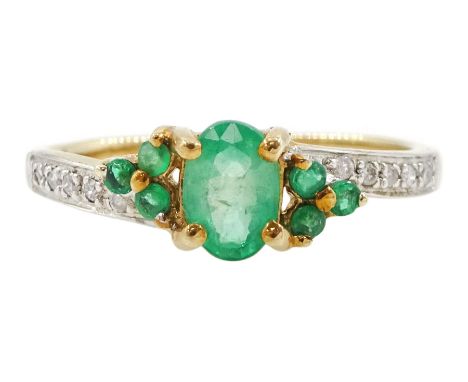 9ct gold oval and round cut emerald ring, with diamond set shoulders, hallmarked, total emerald weight approx 0.40 caratCondi